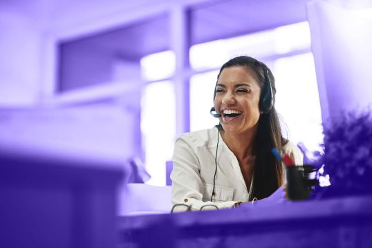 Customer service representative using headset